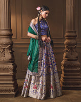 Blue Banarasi Silk Lehenga with Emerald Green Organza Dupatta & Hand Zardosi Work | Jaal Blouse